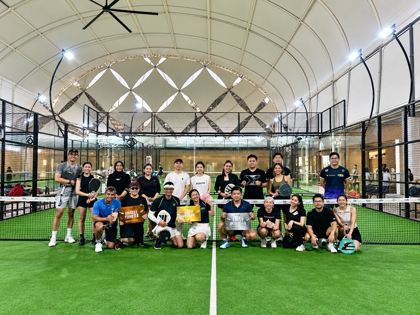 OLA community group on the padel court.